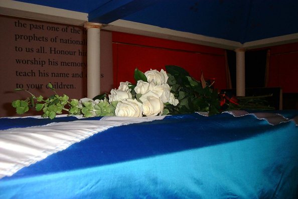 White roses on the coffin